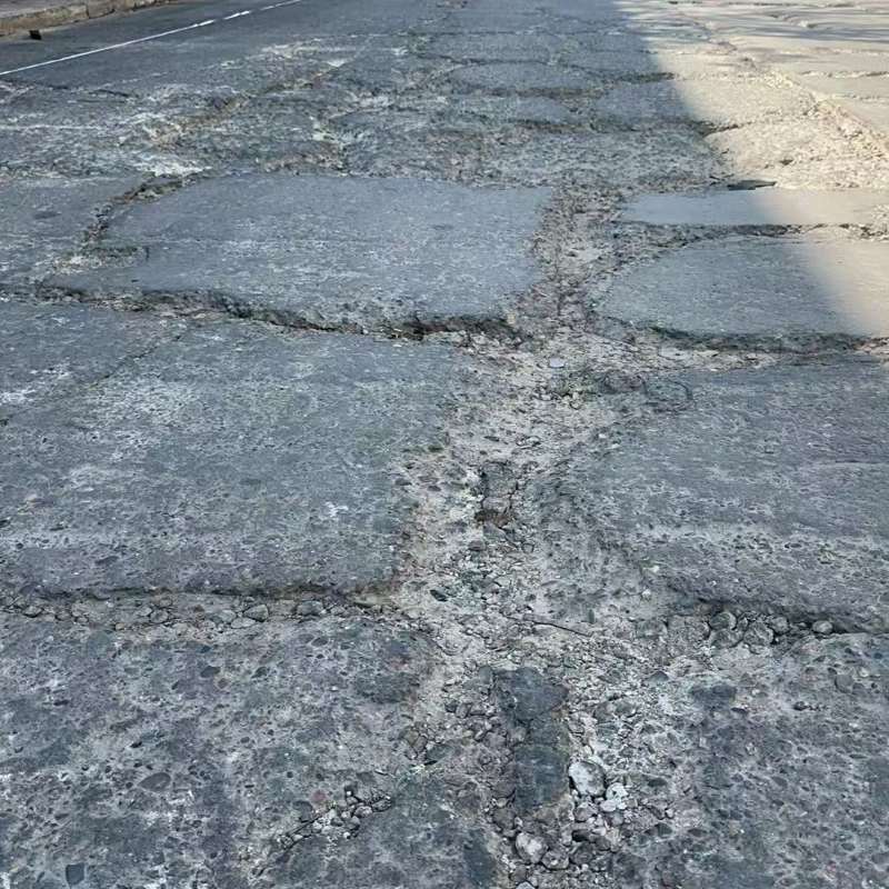 玛曲路面起砂露石子修补料